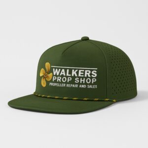 Green Walkers Prop Shop baseball cap with embroidered logo and flower.